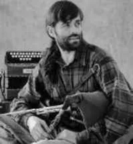 Dave Shaw holding Northumbrian Smallpipes