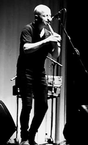 McCusker playing whistle